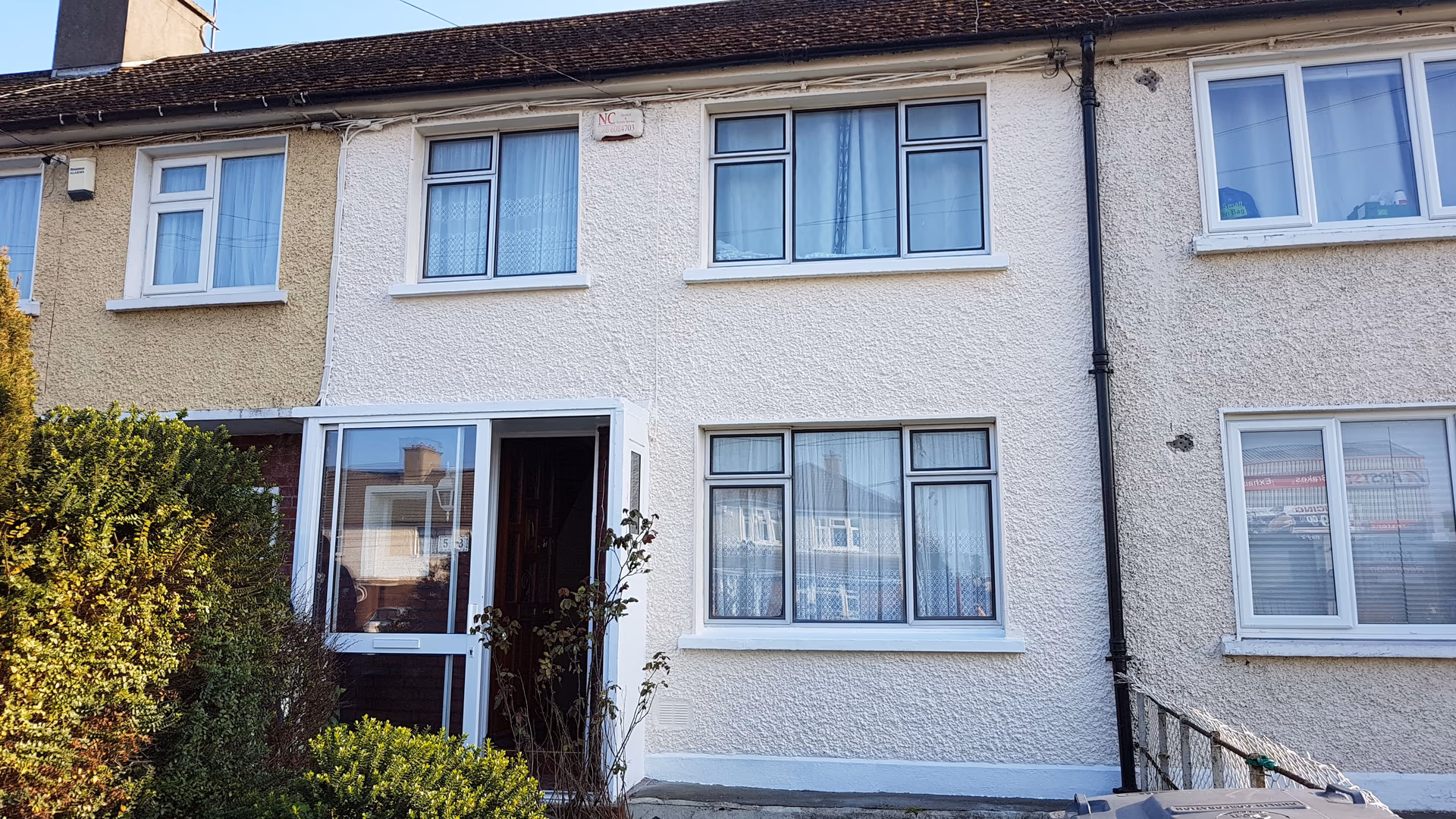 Freshly repainted terraced house exterior in Dublin