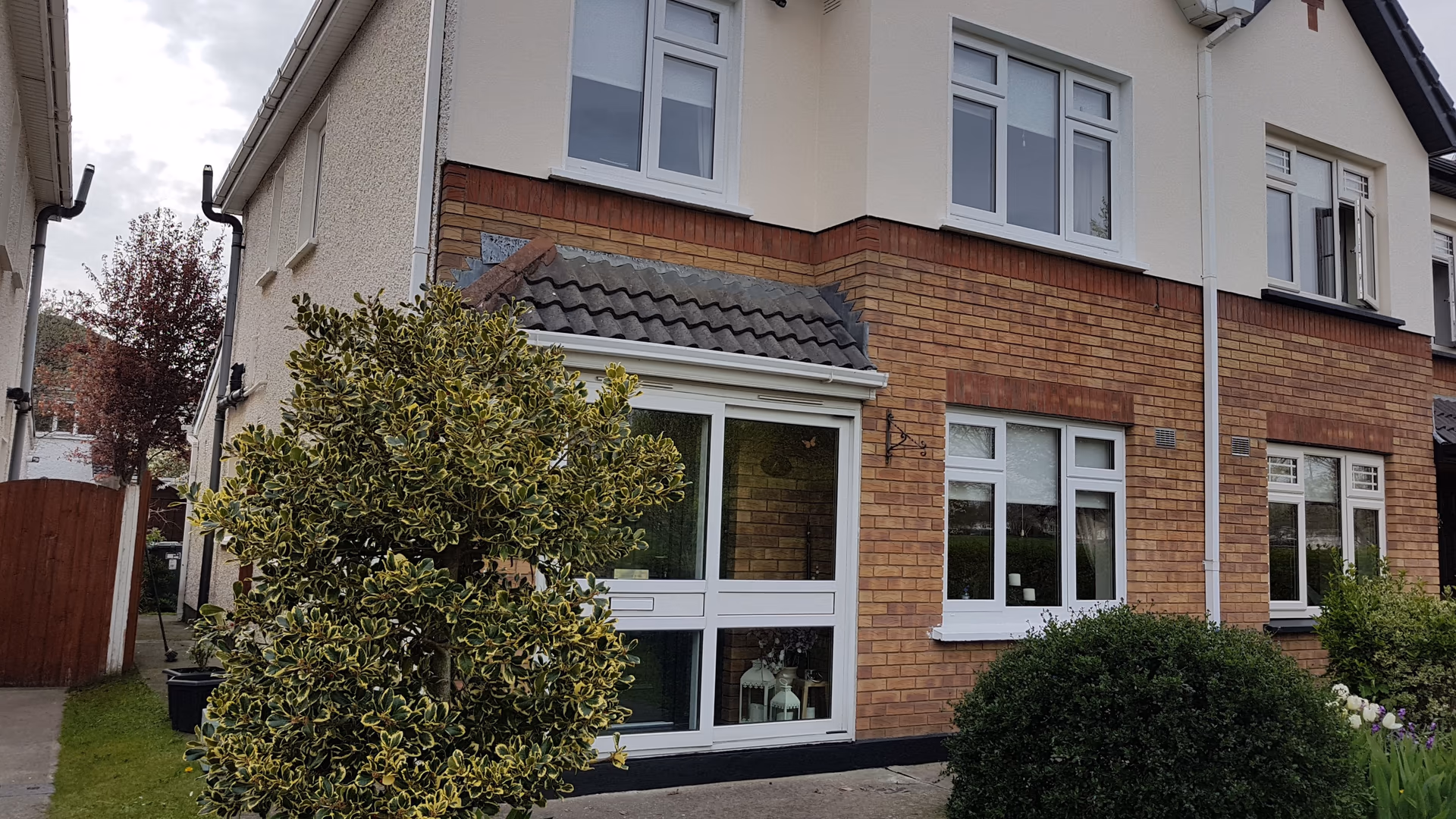 Brick and render semi-detached house exterior painted in Dublin