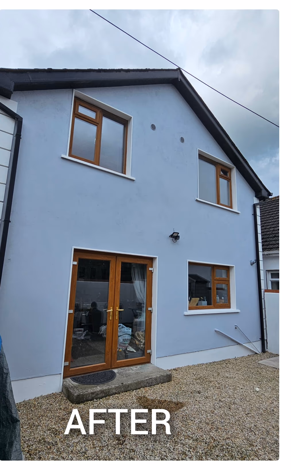 Repainted semi-detached house exterior in Dublin after a full masonry repaint