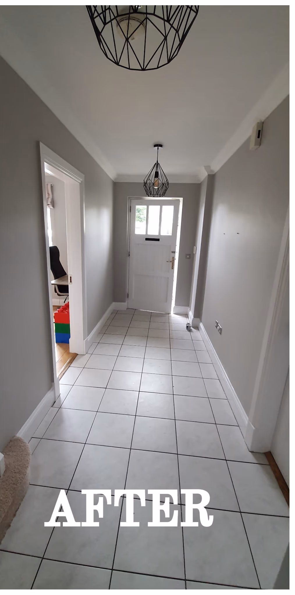 Entrance hallway repainted in grey with white woodwork in Dublin