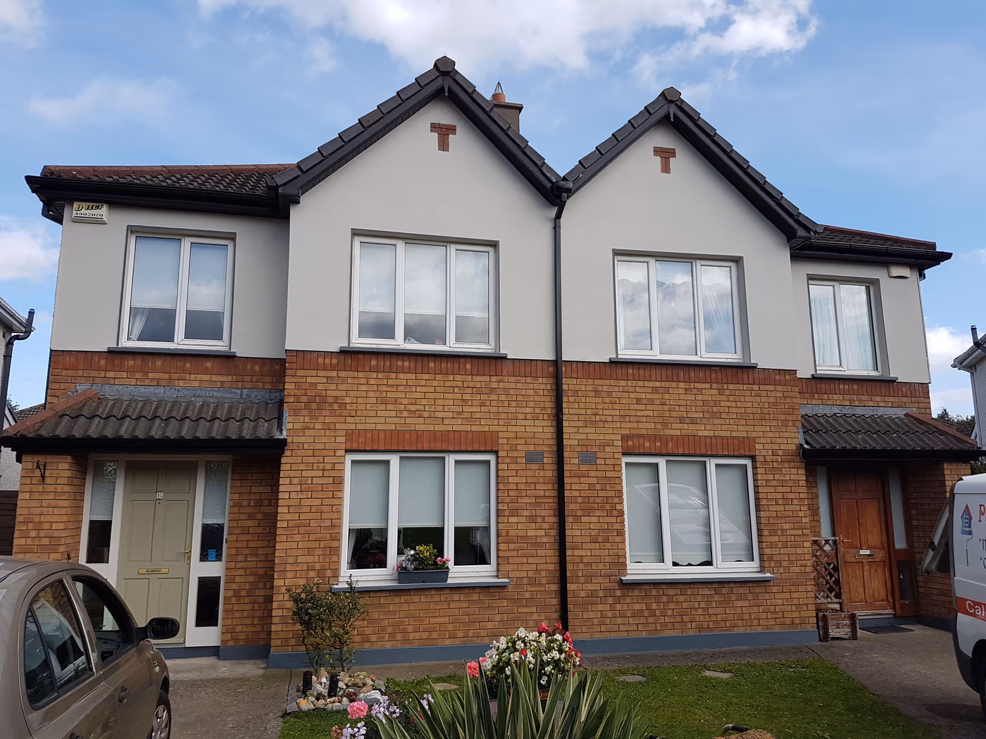 Brick and render semi-detached house repainted in Dublin