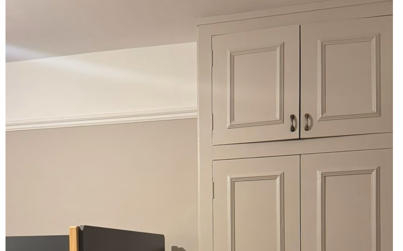 Freshly painted built-in wardrobe with a smooth factory finish in a Dublin home
